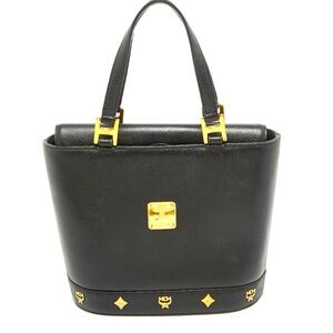 MCM Black Leather Flap Studded Bucket Tote. Preowned.